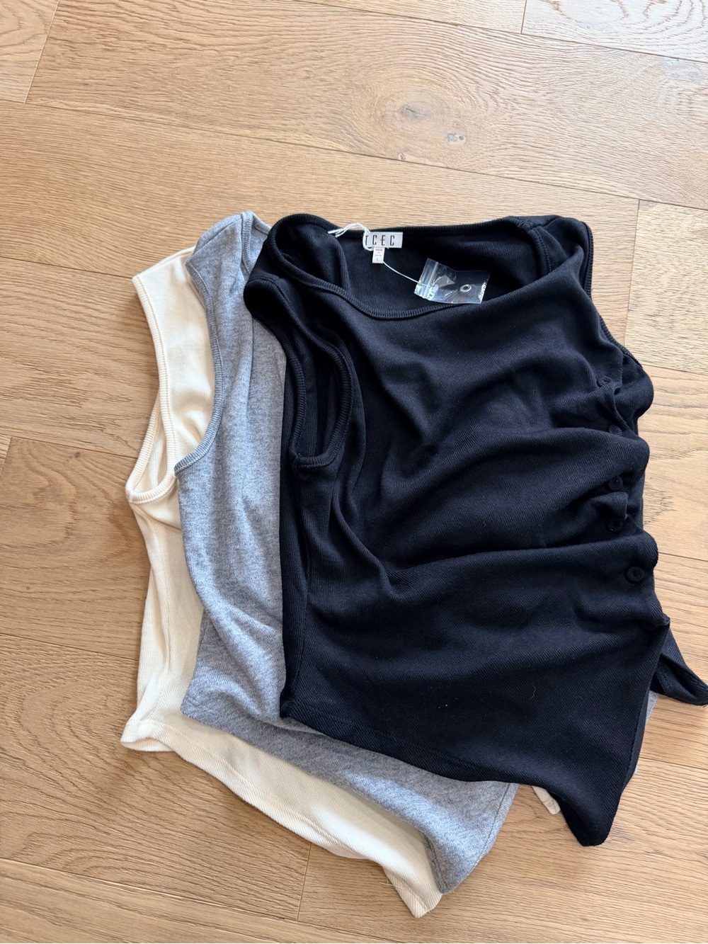 Sleeveless Asymmetric Cream, Black and Heather Grey Tops with Button Detail